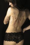 sexy girl with back tattoo